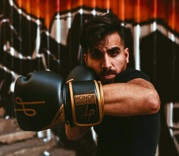Black and Gold Boxing Gloves